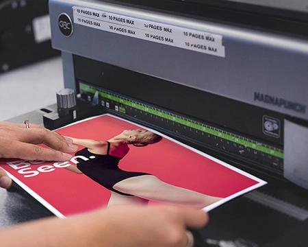  Team member binding a document