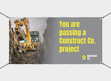 Construction banner with eyelets